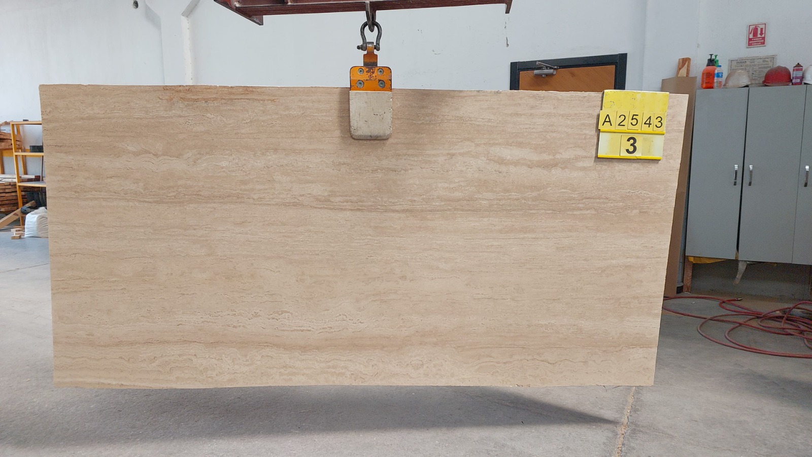 Vein cut Classic Light travertine slab with sharp water channel lines