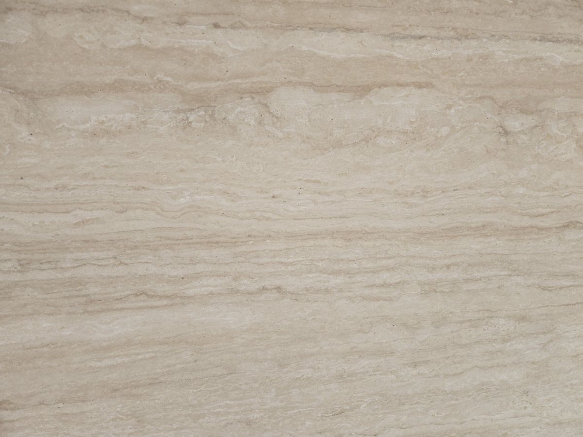 Close-up of vein cut light travertine