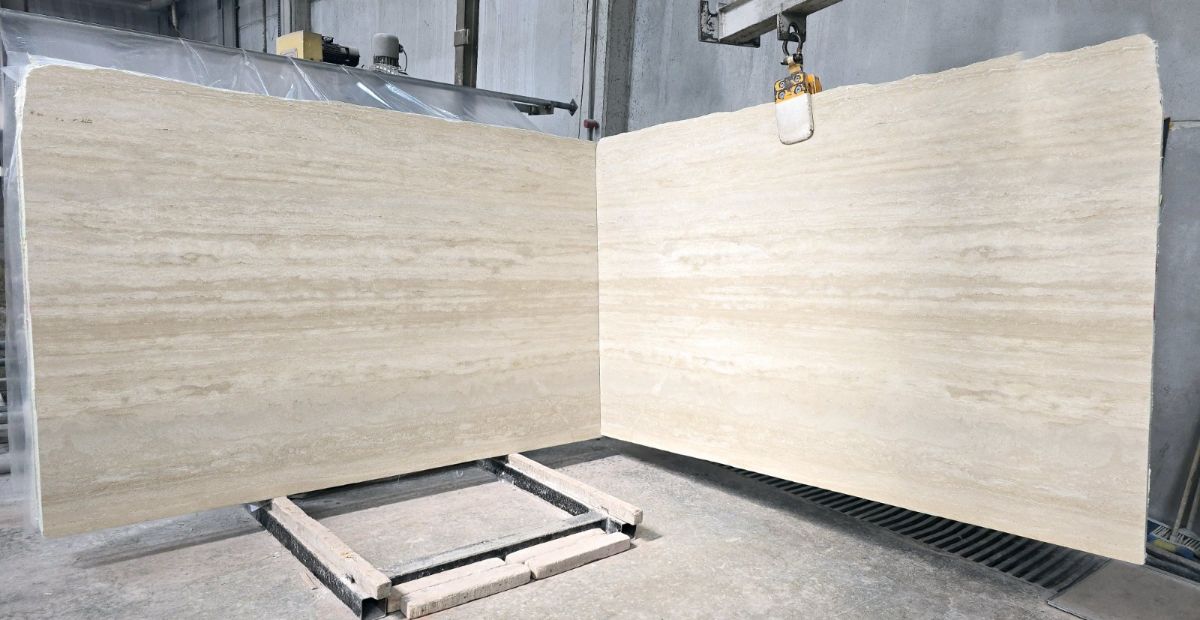 Two vein cut light travertine slabs, book matched